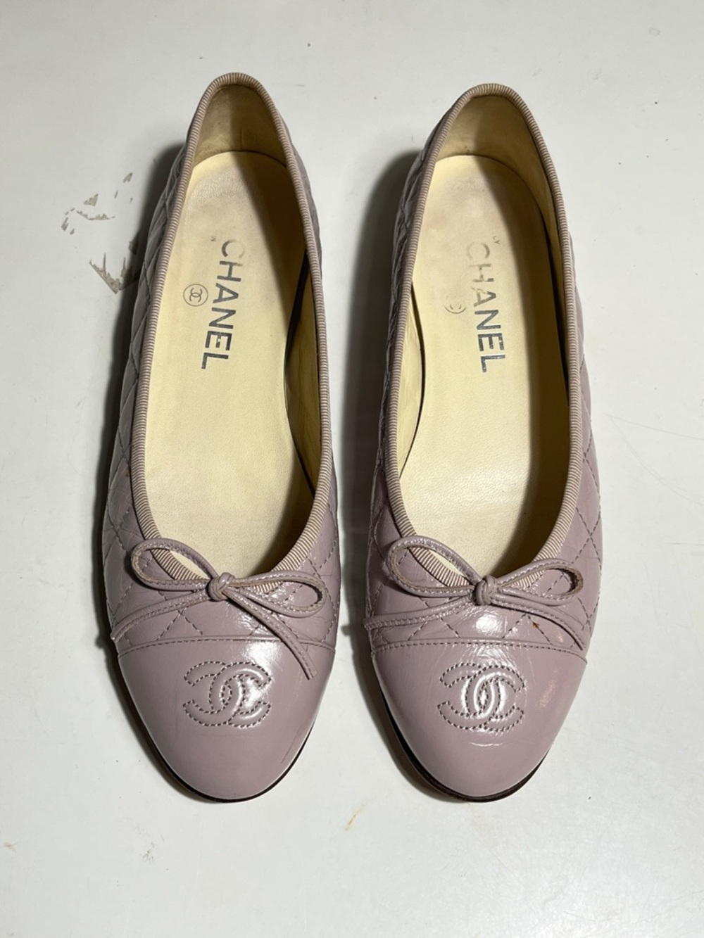 CHANEL Quilted Ballet Flats in Dusty Rose Leather with Bow